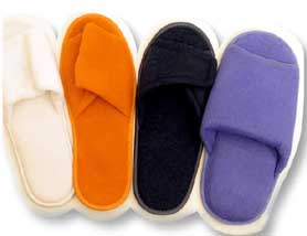 inflight slippers 
terry cotton slippers 
upmarket slippers 
inflight slippers of terry cotton material 
foam base terry cotton slipper 